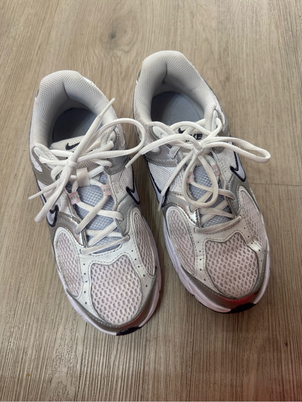 Nike Women’s White and Silver Athletic Sneakers with Black Swoosh